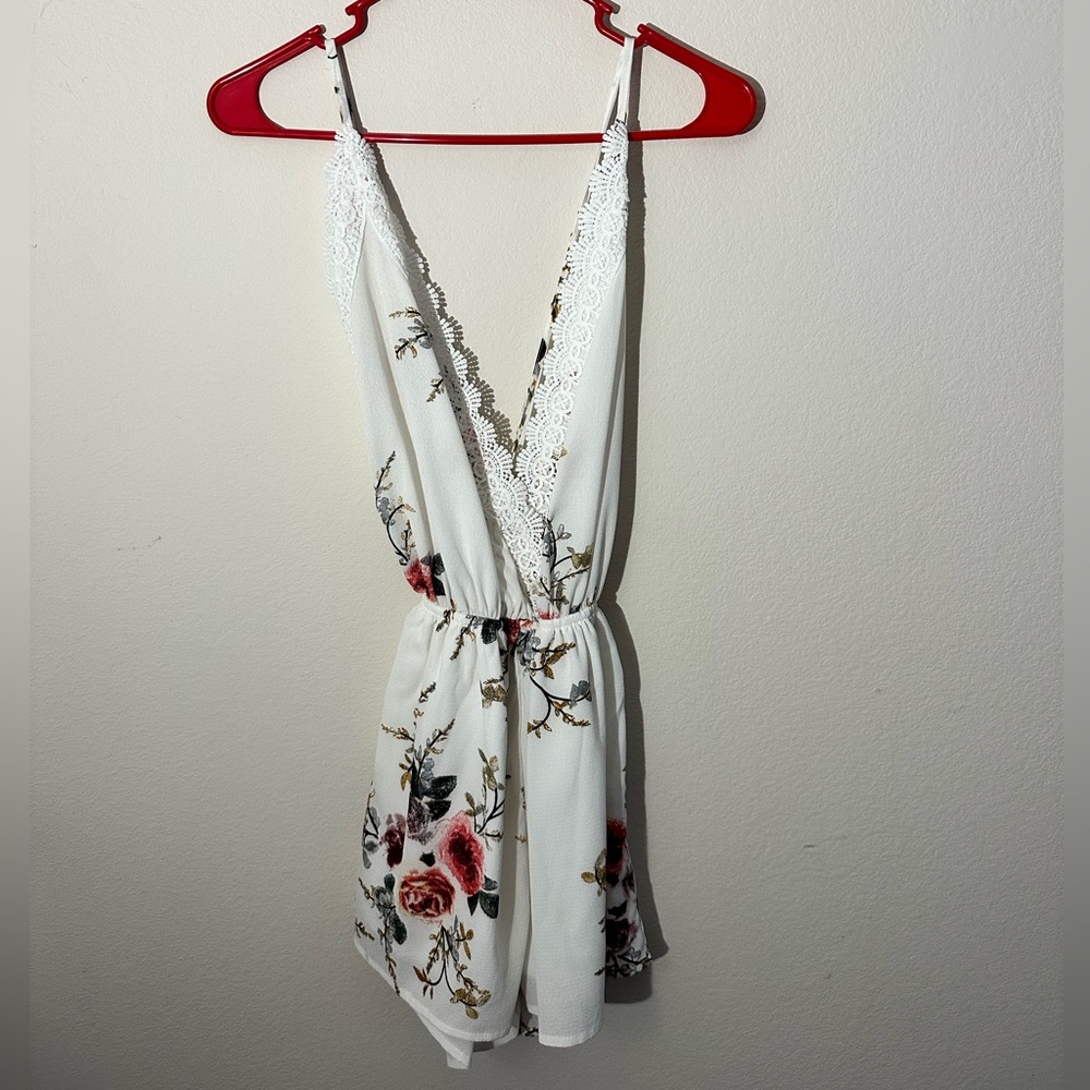 White romper with flower details